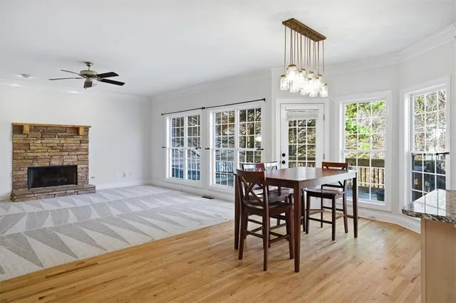 a living room with furniture and windows