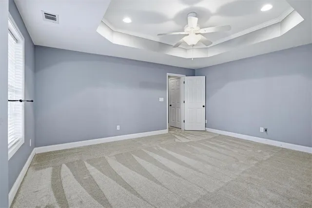 a view of a wooden deck with a yard