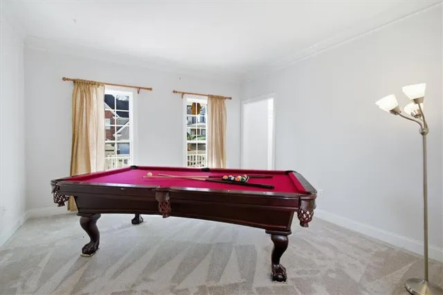 a kitchen with stainless steel appliances granite countertop a sink stove and wooden floor