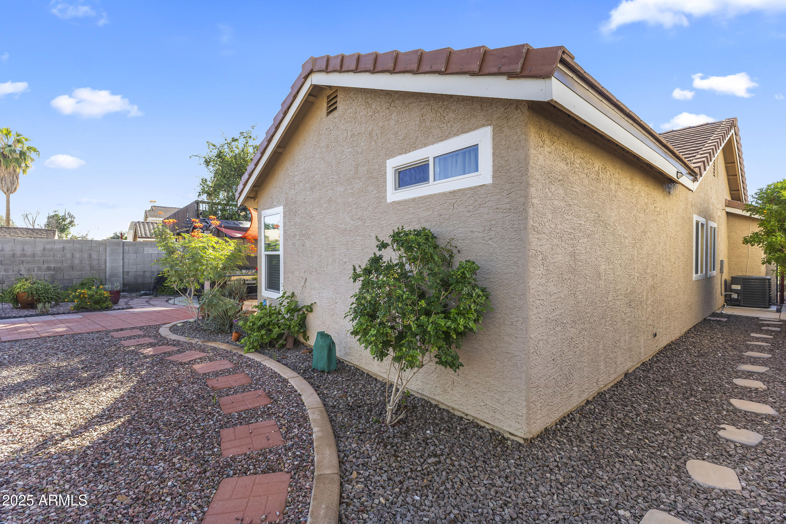 922 West Hudson Way Gilbert, AZ 85233 - Photo 26 of 27 a front view of a house with garden