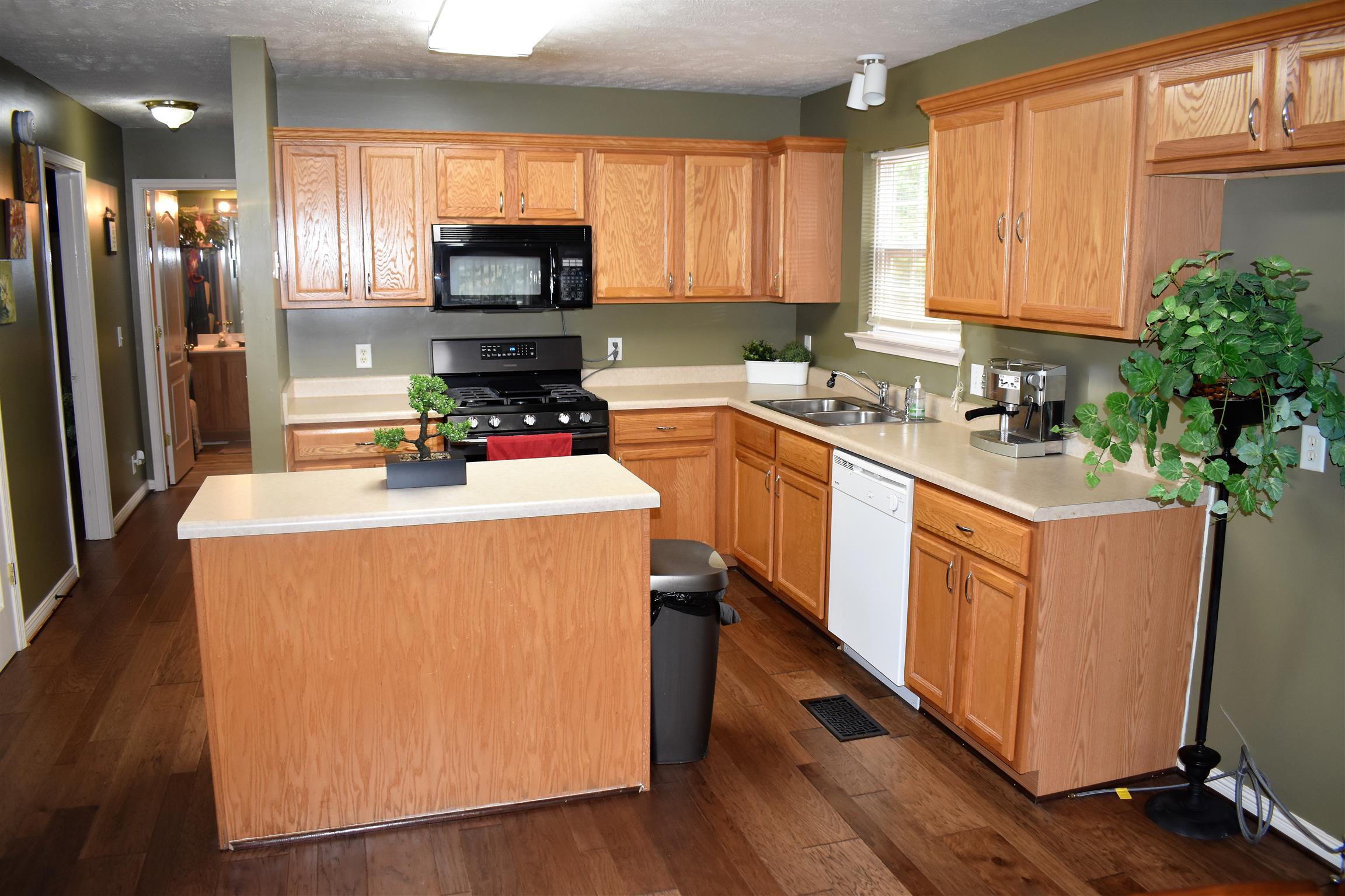 2852 Rader Ridge Court Antioch, TN 37013 - Photo 3 of 16 a kitchen with a refrigerator stove top oven and sink