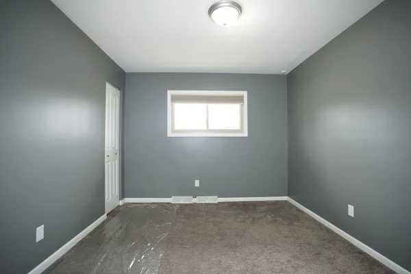 an empty room with a window