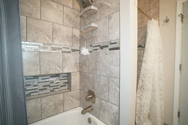 a bathroom with a bathtub
