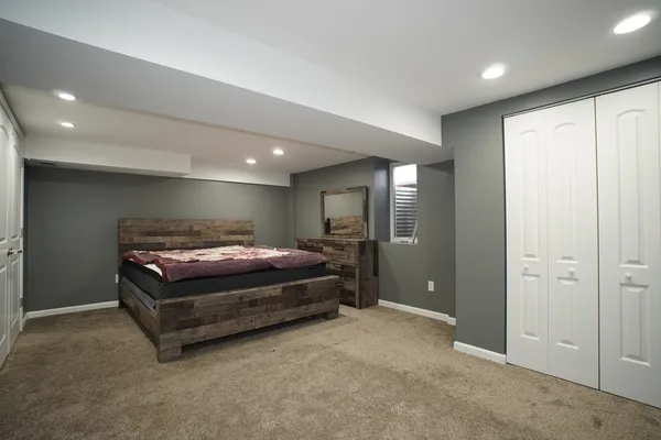 a bathroom with a sink and a large mirror