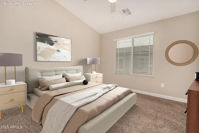 a bedroom with bed and a window