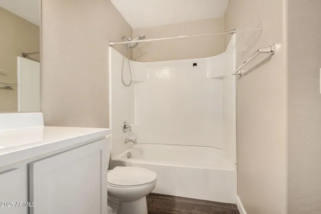 a bathroom with a sink a toilet and a bathtub