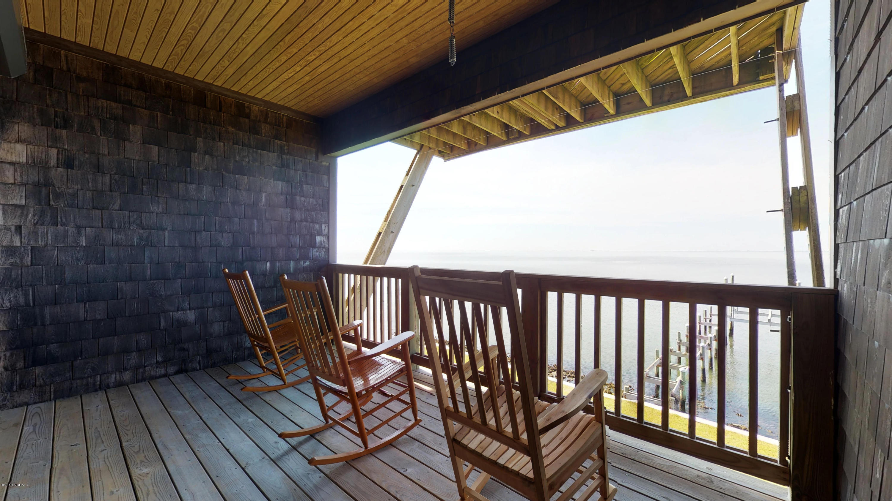 616 Nelson Neck Road Sealevel, NC 28577 - Photo 23 of 41 2nd Floor Balcony