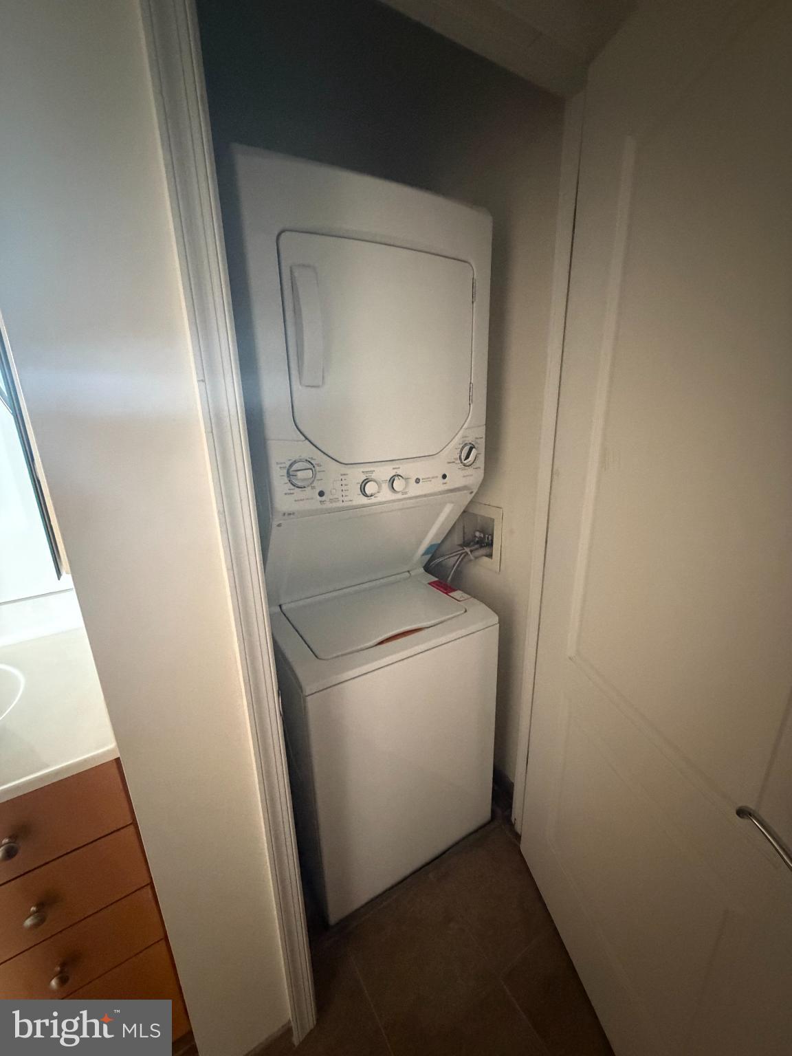 1111 11th Street Northwest, Unit 608 Washington, DC 20001 - Photo 23 of 29 a utility room with dryer and washer