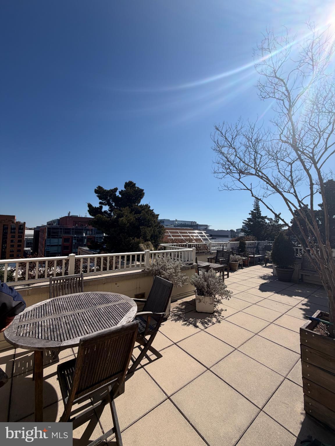 1111 11th Street Northwest, Unit 608 Washington, DC 20001 - Photo 24 of 29 a terrace with outdoor seating and city view