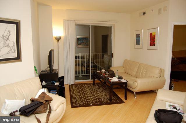 1111 11th Street Northwest, Unit 608 Washington, DC 20001 - Photo 6 of 15 Modern living space with natural light.