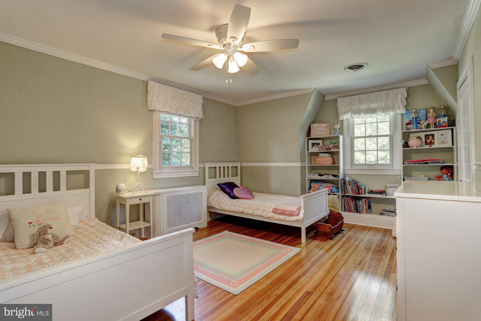 601 Kingston Road Baltimore, MD 21212 - Photo 36 of 56 Bedroom 2. Pine flooring on 2nd level.