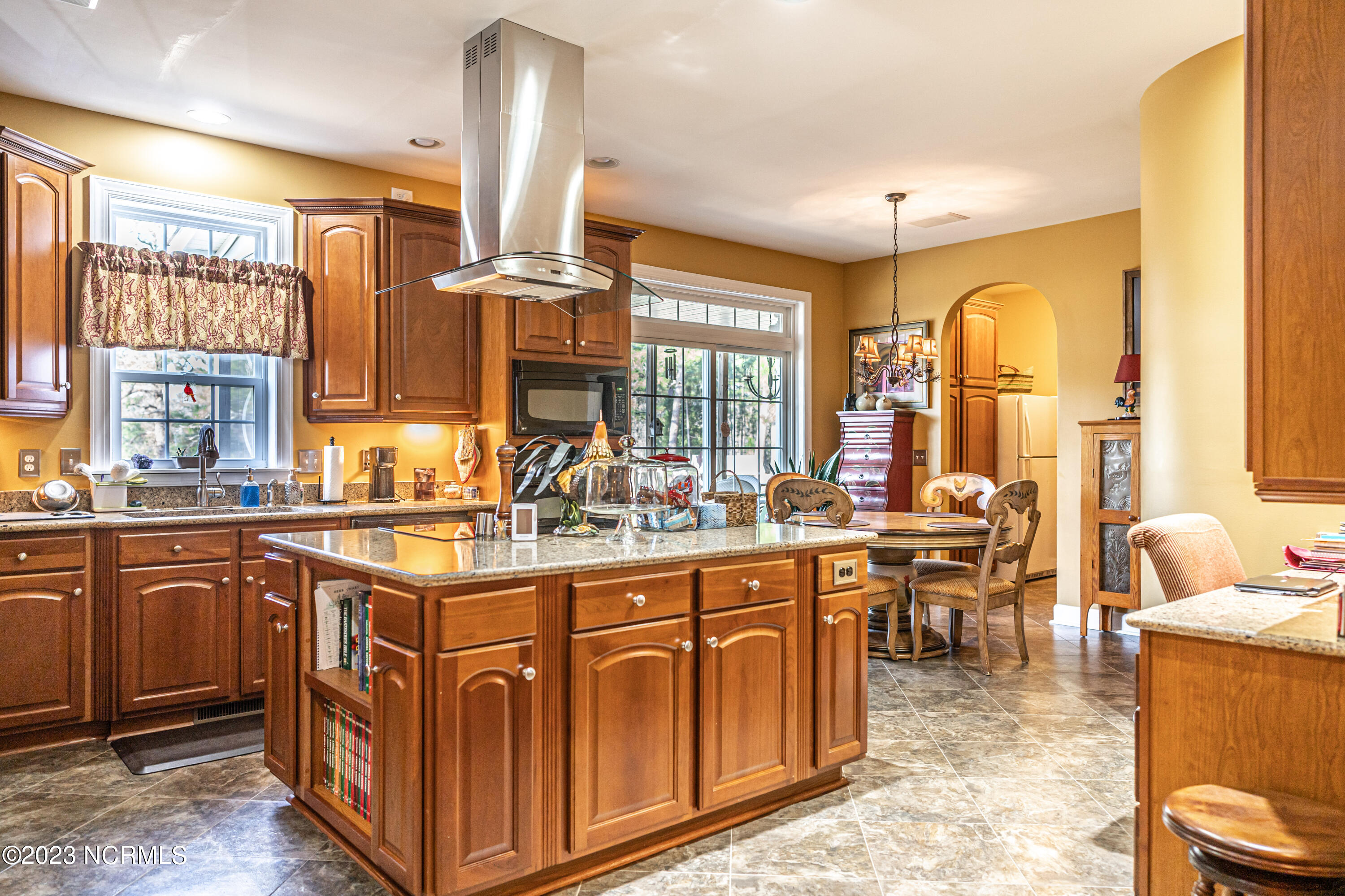 120 St Joseph Road Southern Pines, NC 28387 - Photo 7 of 33 Kitchen with Island Cooktop