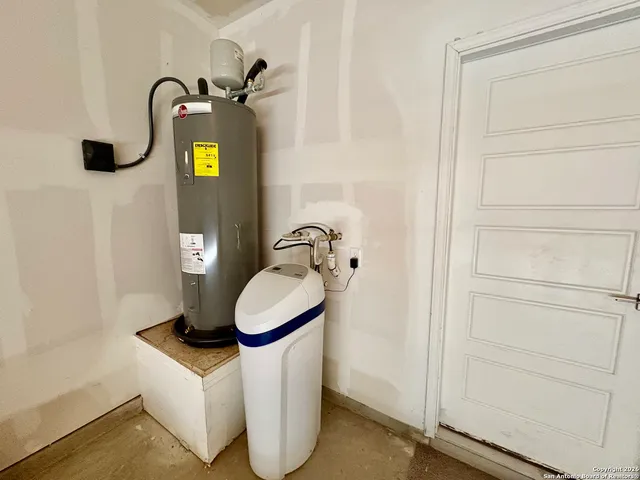 a bathroom with a sink and mirror