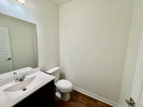 a bathroom with a sink and a toilet