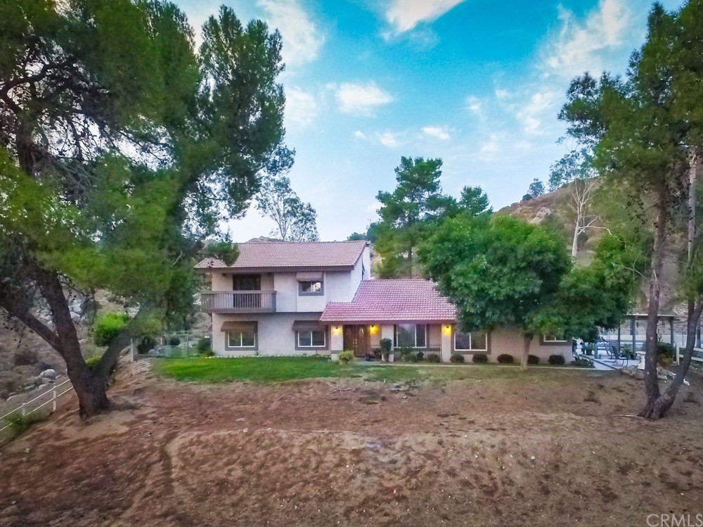 24810 Valley Ranch Road Moreno Valley, CA 92557 - Photo 1 of 1 FRONT OF HOME SHOWING BALCONY OFF UPSTAIRS MASTER SUITE