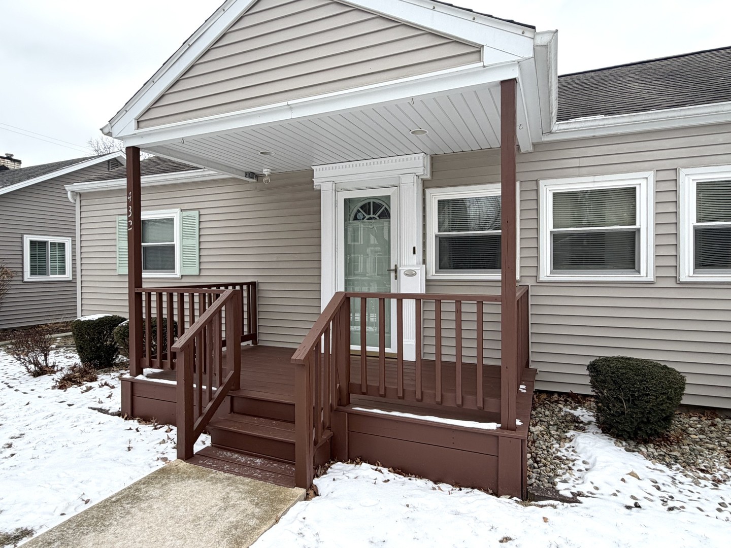 432 Roosevelt Road LaSalle, IL 61301 - Photo 2 of 13 a view of a deck with two couches and wooden floor