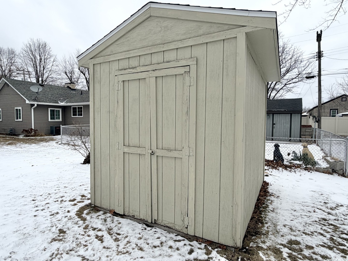 432 Roosevelt Road LaSalle, IL 61301 - Photo 4 of 13 a view of a house with a yard covered in snow