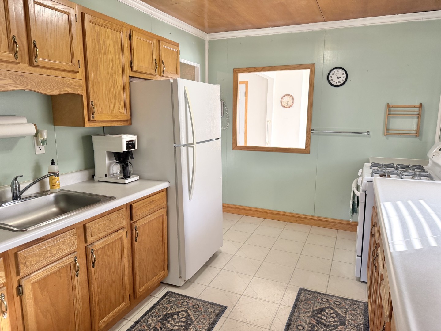 432 Roosevelt Road LaSalle, IL 61301 - Photo 7 of 13 a kitchen with stainless steel appliances a refrigerator sink and cabinets