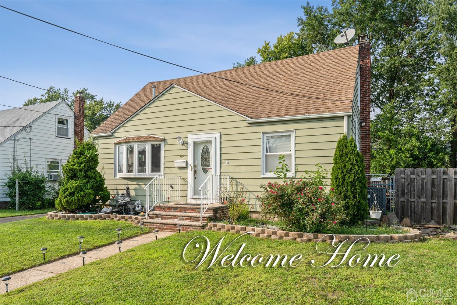 205 Midfield Road Colonia, NJ 07067 - Photo 1 of 26 a view of a house with a yard