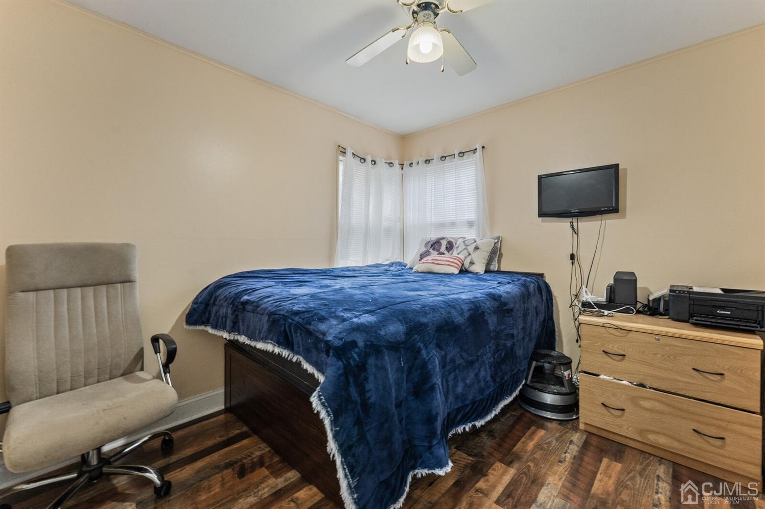 205 Midfield Road Colonia, NJ 07067 - Photo 14 of 26 a bedroom with a bed and flat screen tv