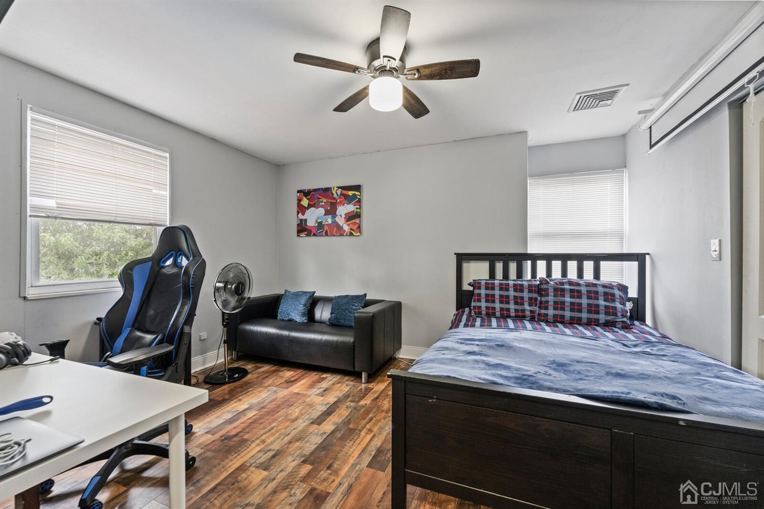 205 Midfield Road Colonia, NJ 07067 - Photo 17 of 26 a bedroom with furniture and a window