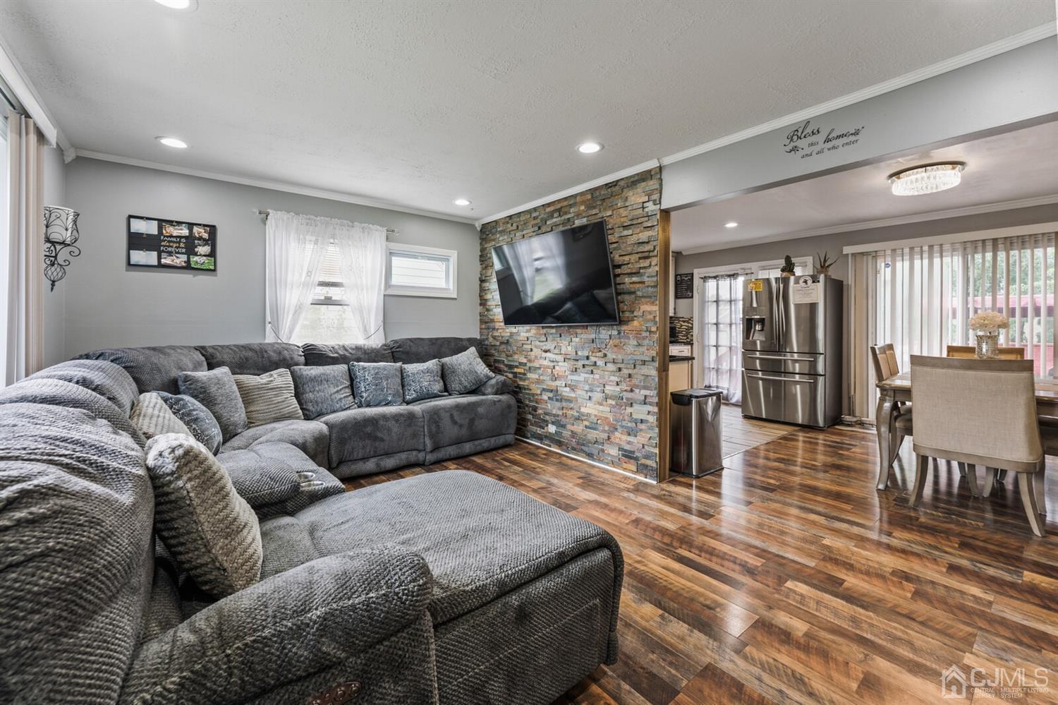 205 Midfield Road Colonia, NJ 07067 - Photo 5 of 26 a living room with furniture and a flat screen tv