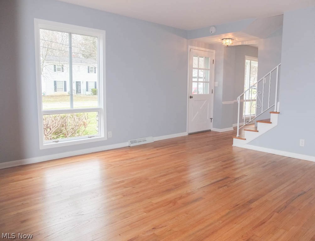 421 Holliston Road Akron, OH 44333 - Photo 3 of 22 Formal living room with wood flooring.