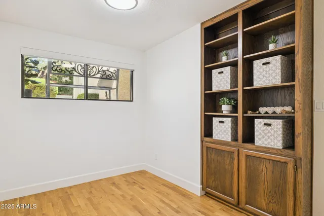 a view of kitchen with cabinets