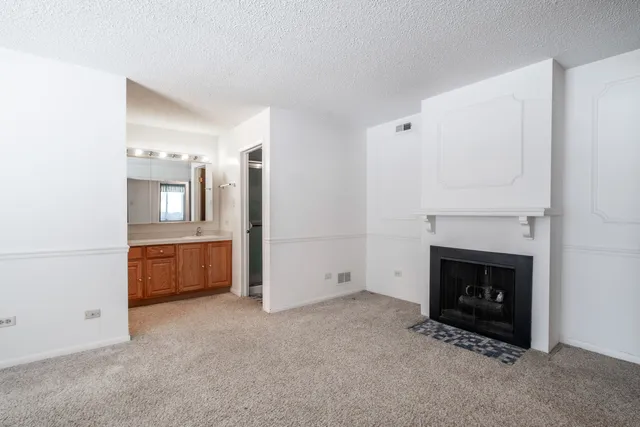 a view of a livingroom with a fireplace