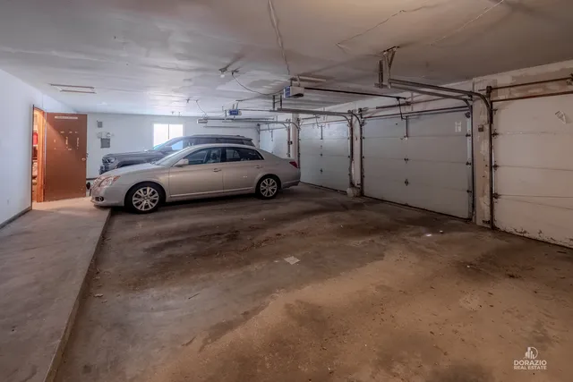 a bedroom with a bed and a hallway