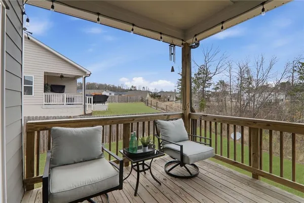 a view of a chair on the roof deck