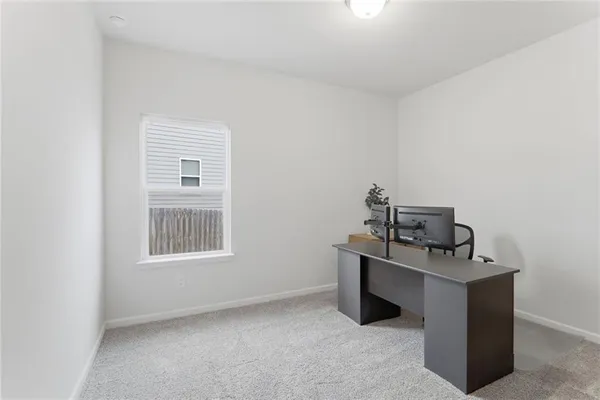 a view of workspace with furniture