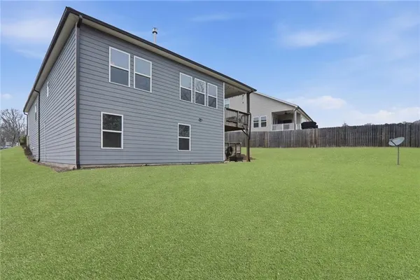 a front view of house with yard