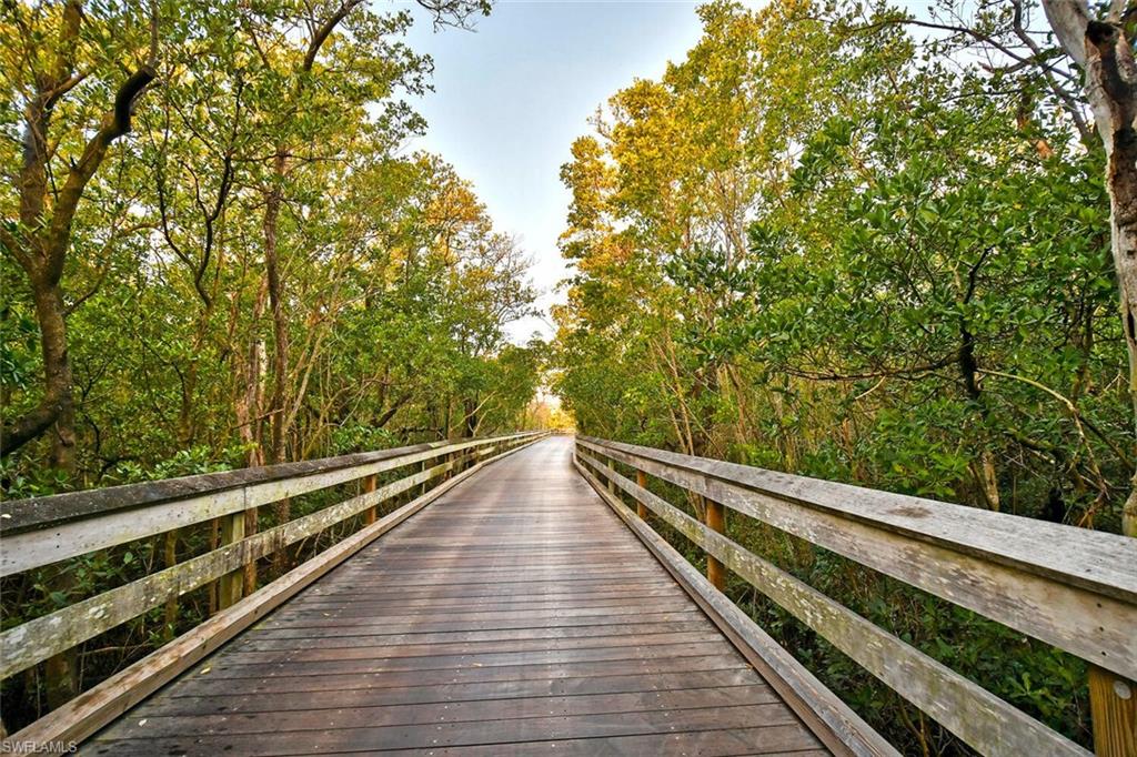 6631 Trident Way, Unit D3 Naples, FL 34108 - Photo 46 of 49 Walkway to Beach