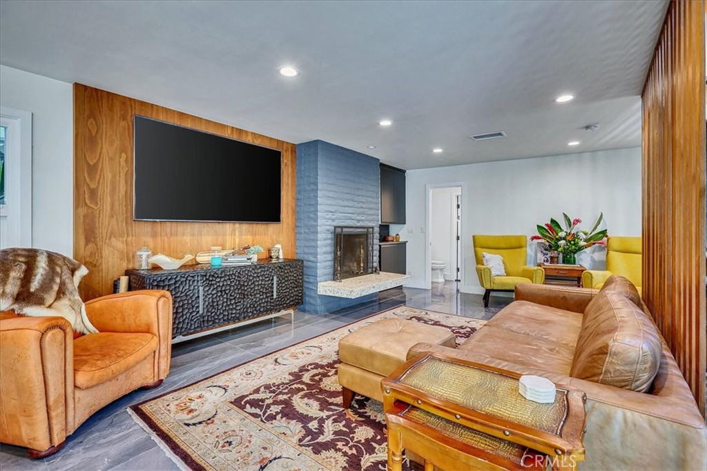 35 Geneva Walk Long Beach, CA 90803 - Photo 13 of 75 a living room with furniture and a flat screen tv