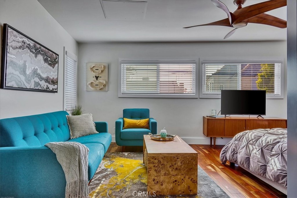 35 Geneva Walk Long Beach, CA 90803 - Photo 34 of 75 a bedroom with furniture and a flat screen tv