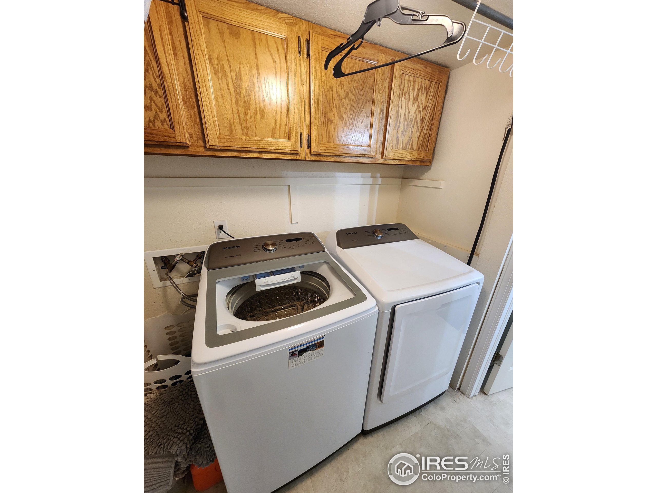 1324 Dawes Street Sterling, CO 80751 - Photo 32 of 39 a utility room with dryer and washer