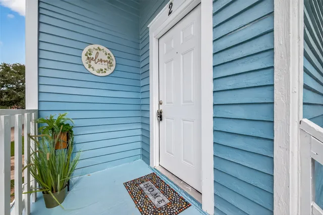 a view of a entryway with wooden floor