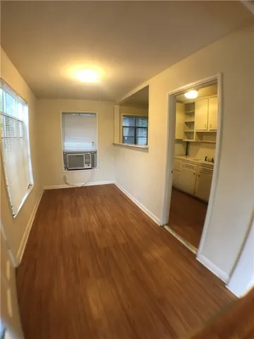 a view of an empty room and window