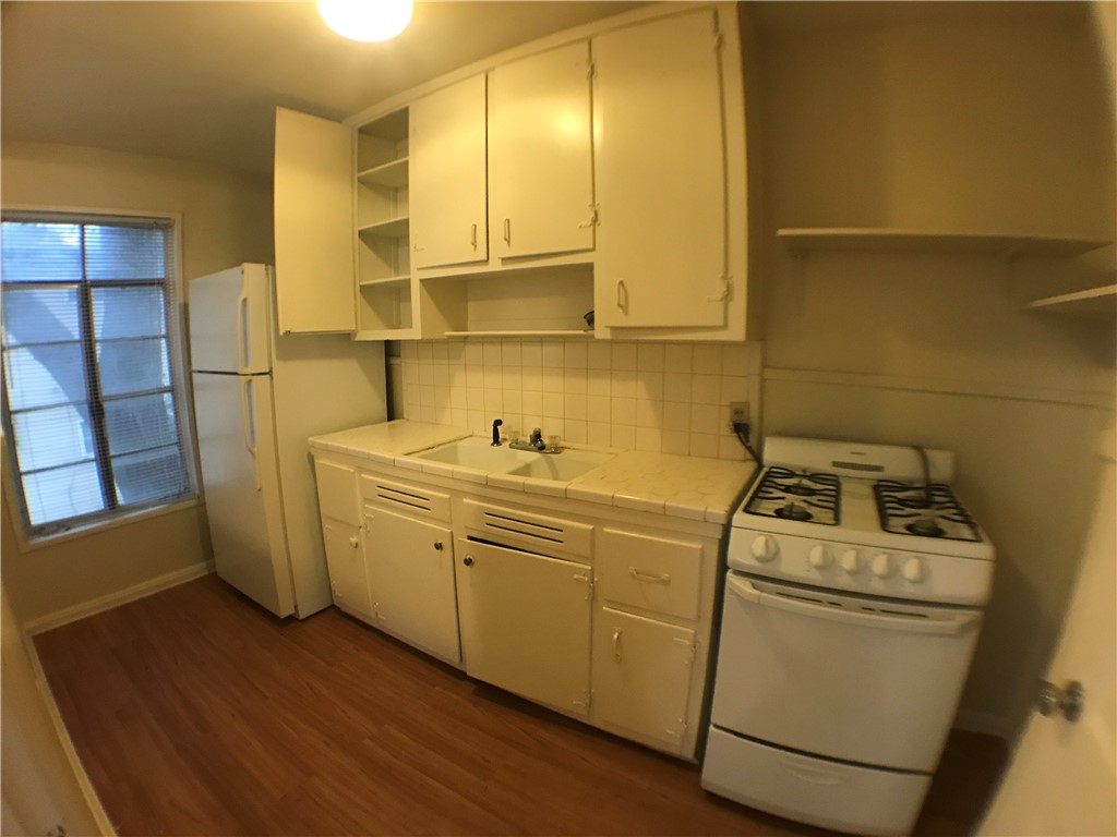 1008 West 25th Street, Unit C Austin, TX 78705 - Photo 4 of 10 a room with storage and utility