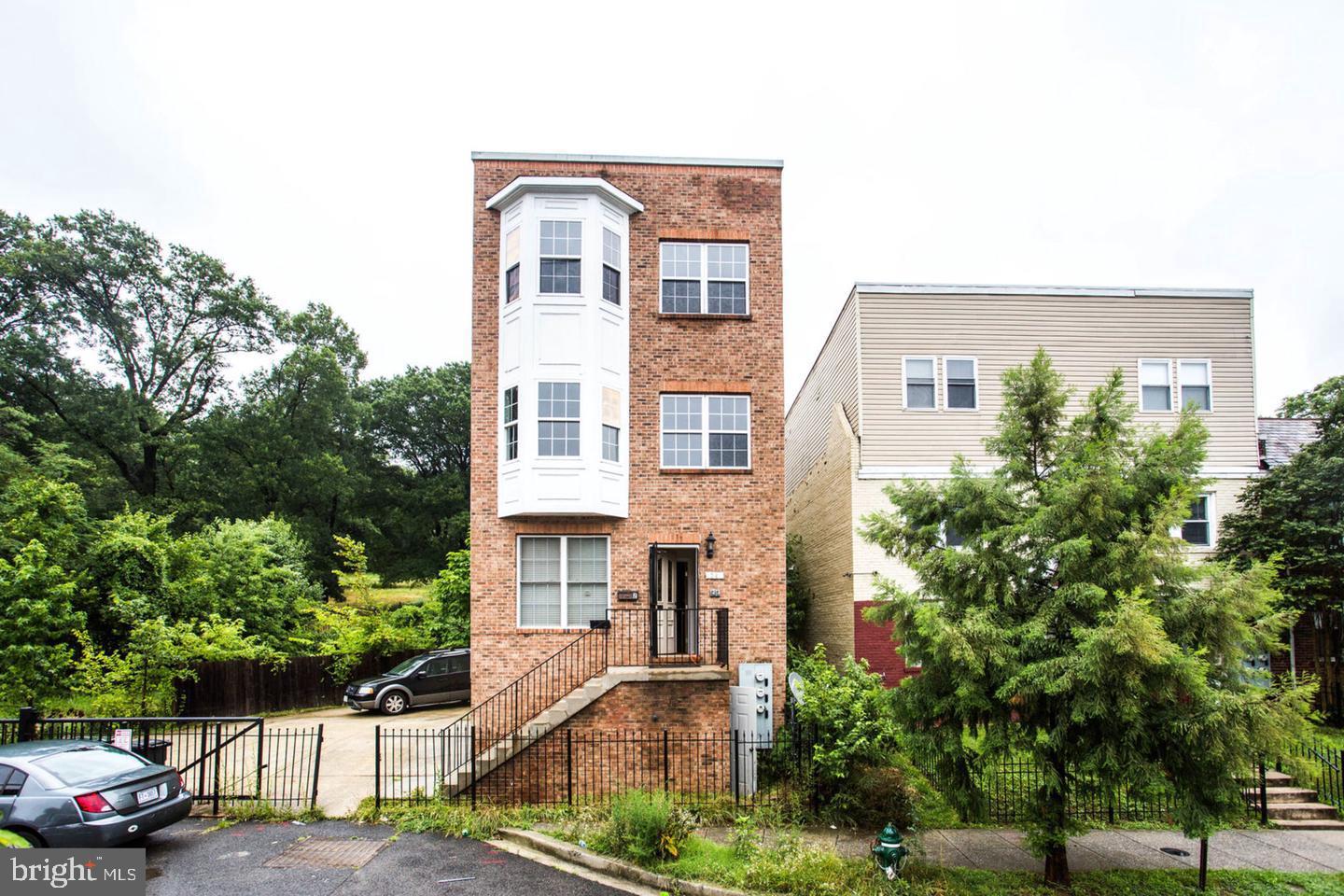 front view of a house with a street