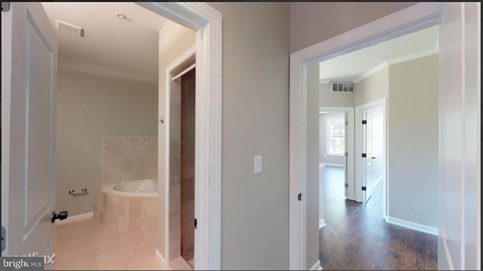 1245 18th Street Northeast, Unit 2 Washington, DC 20002 - Photo 5 of 12 a bathroom with a granite countertop shower