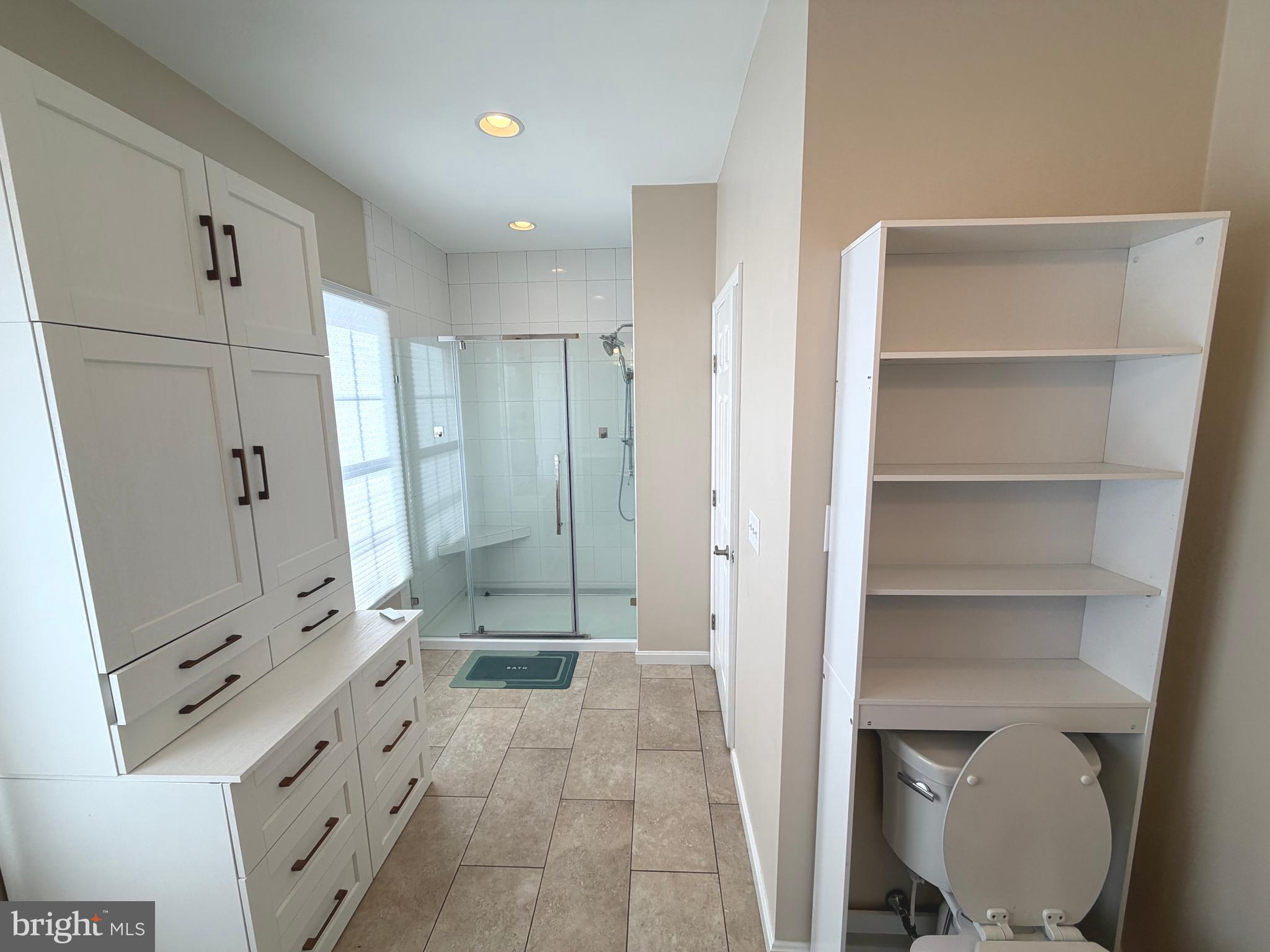 89 South Shore Drive Dover, DE 19901 - Photo 17 of 59 a bathroom with a double vanity sink toilet and shower