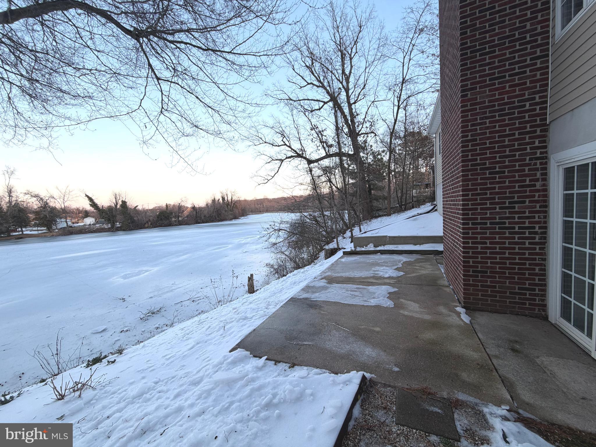 89 South Shore Drive Dover, DE 19901 - Photo 44 of 59 a view of a backyard of the house