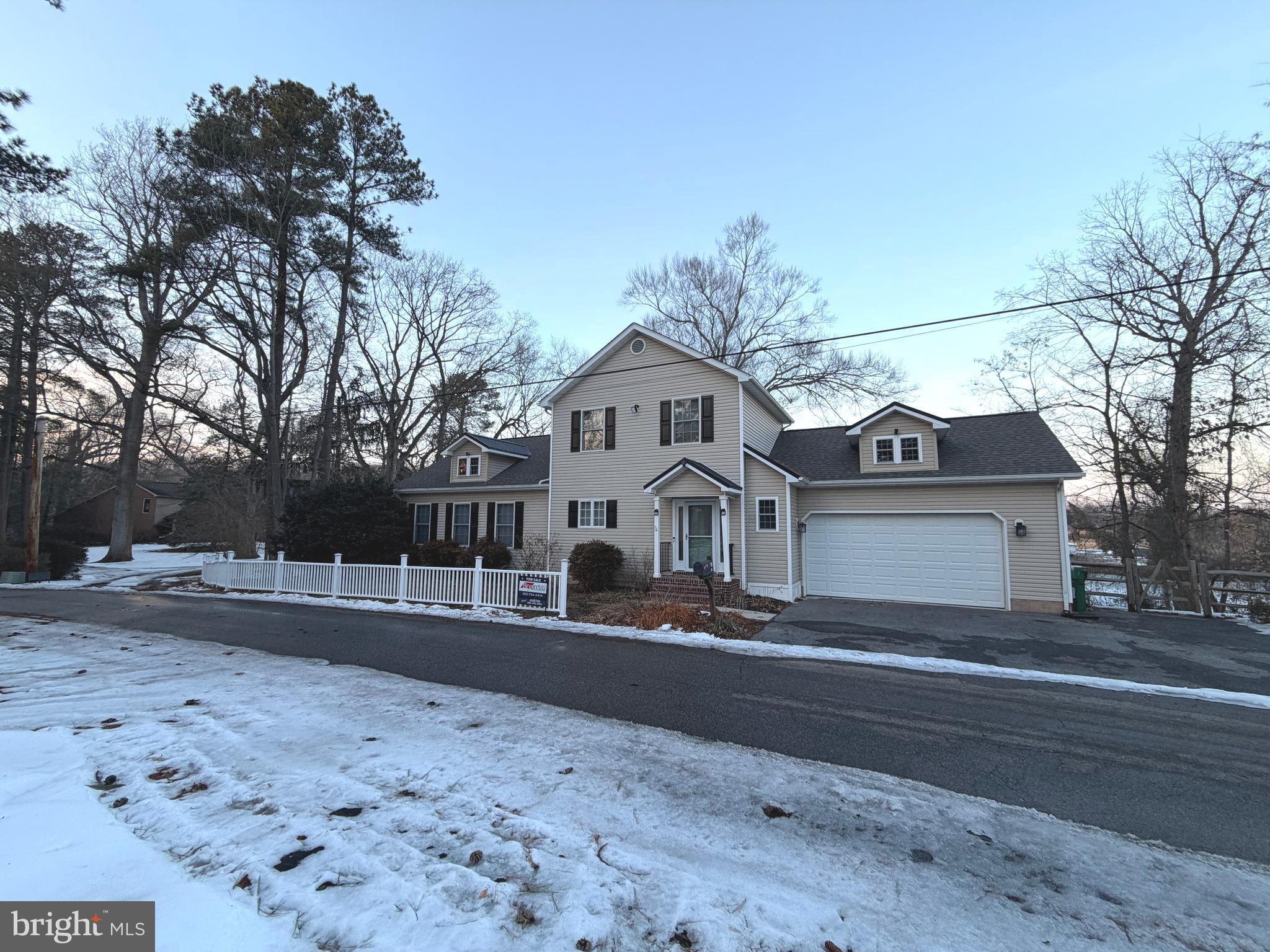 89 South Shore Drive Dover, DE 19901 - Photo 56 of 59 a front view of a house with a yard