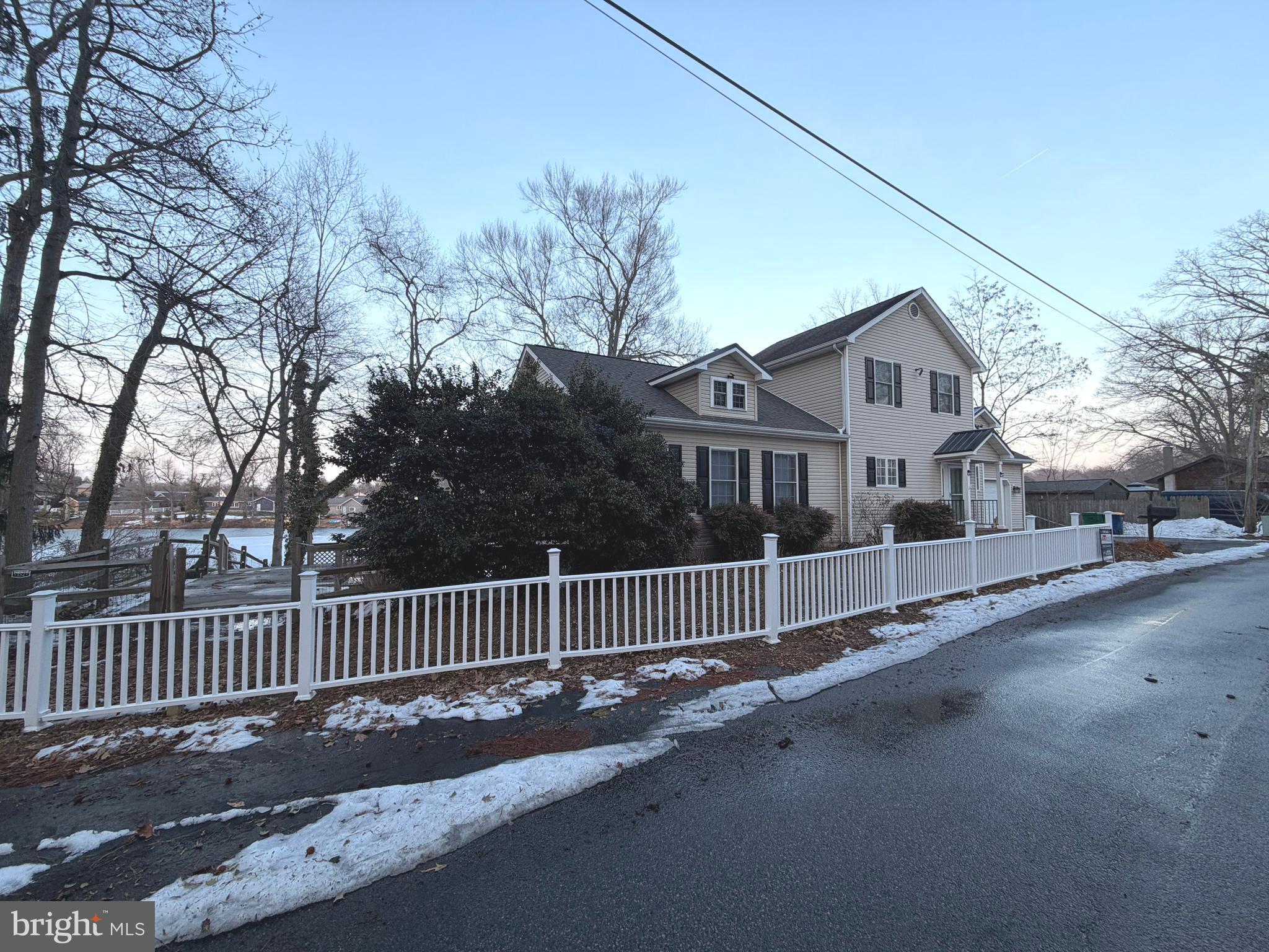 89 South Shore Drive Dover, DE 19901 - Photo 59 of 59 a view of a street with a wooden fence