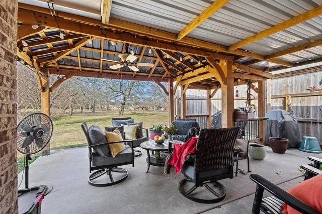 a view of outdoor space with swimming pool and trees