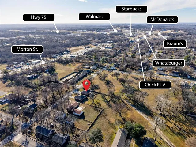 a view of a room that has a bed and a closet