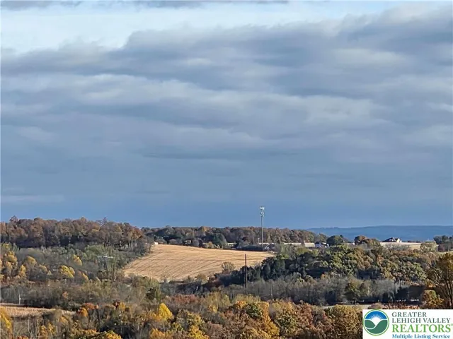 a kitchen with stainless steel appliances granite countertop a sink and a stove