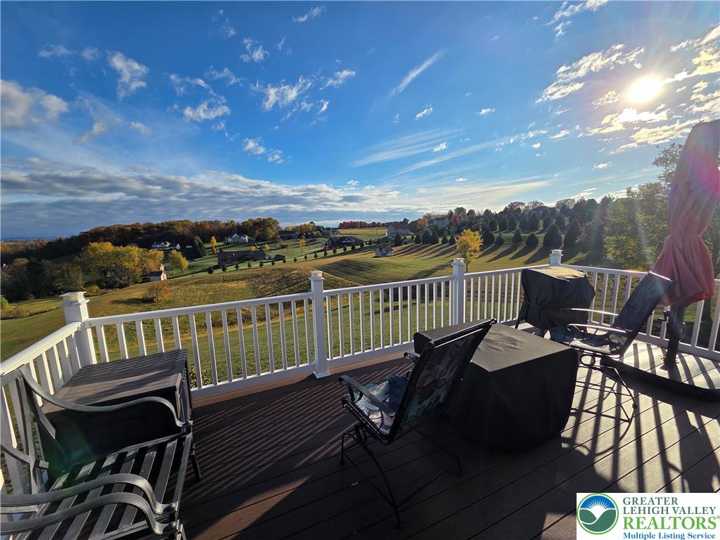 3393 Crestview Lane Walnutport, PA 18088 - Photo 16 of 68 a view of a balcony with two chairs and a table